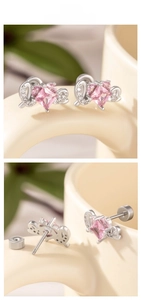 Detail of pink zircon earring with screw back closure and silver wing accents
