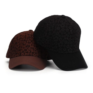 Women's floral baseball caps in black and brown, featuring vintage flower patterns