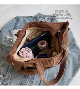 Interior view of brown corduroy tote showing spacious capacity for daily items