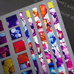 Artistic gold foil nail stickers with colorful alcohol ink marbling and metallic texture