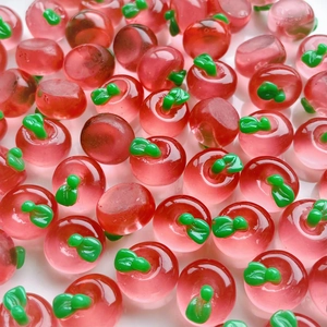 Miniature red resin apple charms with green leaves for DIY crafts and hair accessories