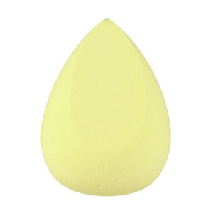 Detail view of a soft lemon yellow teardrop makeup sponge for flawless foundation application