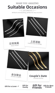 Close-up of gold and silver flat snake chains with lobster clasp on leather background