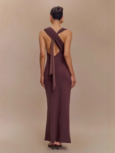 Elegant deep brown backless maxi dress with cross knot detail and draped ribbons