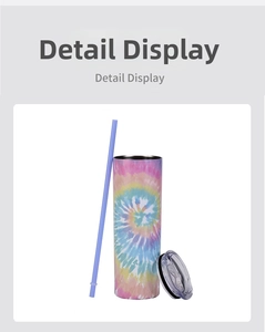 Detail view of colorful tie-dye skinny tumbler with a straw and clear sealing lid