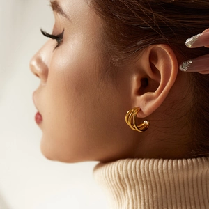 Minimalist 18K gold plated triple layered round hoop earrings for women shown on model