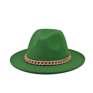 Detailed view of dark green wool fedora hat featuring a stylish pink matte plastic chain