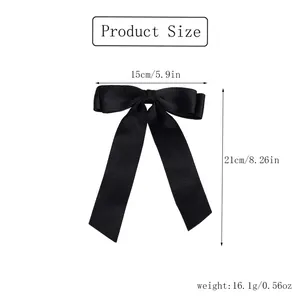 Size chart for black satin bow hair clip showing 15x21cm dimensions and 16.1g weight