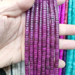 Macro shot of 3x6mm natural purple amethyst stone spacer beads for DIY jewelry making