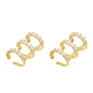 Golden triple-layer cuff earrings with sparkling rectangular zircon stones on white backdrop