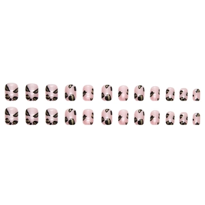 Set of 24 short round pink press-on nails with stylish black and gold leopard print pattern