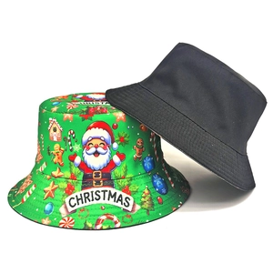 Cappello a secchiello reversibile con motivi natalizi di Babbo Natale e renne su verde
