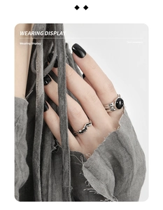 Close-up of S925 sterling silver geometric rings with oval black onyx for women