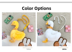 Detail of plush duck crossbody bags in white and yellow with orange checkered scarves