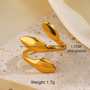 Detail of adjustable 18K gold plated stainless steel leaf ring on a cream stone base