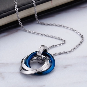 Stainless steel interlocking three-ring necklace with blue detail and small diamonds