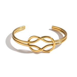Minimalist gold-plated stainless steel open bracelet with a geometric double knot design