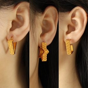 Retro gold star and geometric titanium steel earrings with textured metal watchband design
