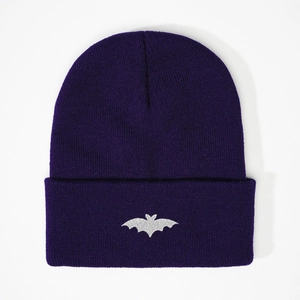 Dark purple knitted beanie hat featuring a grey bat embroidery with a folded cuff design
