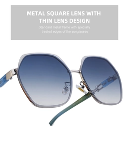 Detail of square sunglasses showing silver metal frame and blue gradient lenses