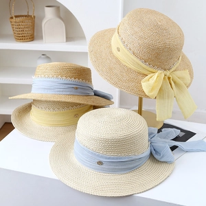 Elegant French straw sun hat with pearls, chiffon ribbon bow and a foldable dome design