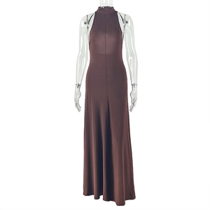 Detail of slim fit chocolate brown halter maxi dress with elastic knit A-line skirt