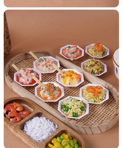 Detailed close-up of miniature food keychains featuring realistic resin rice and shrimp models