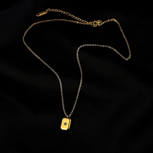 Vintage gold square star pendant necklace with central black gemstone for women