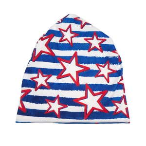 Detail of star and stripe patterns on a soft knit headwrap showing fabric texture