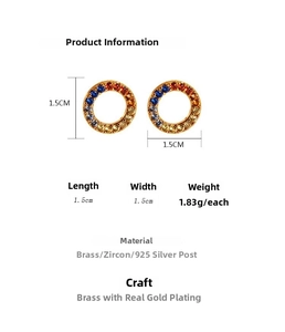 Close-up of small round earrings with rainbow zircons and 1.5cm diameter details