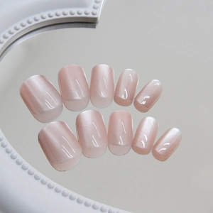 Set di 10 unghie finte rosa cat eye con eleganti punte ovali e finitura lucida morbida