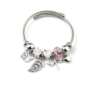 Detail of steel cable charm bracelet with pink enamel flower and butterfly charms