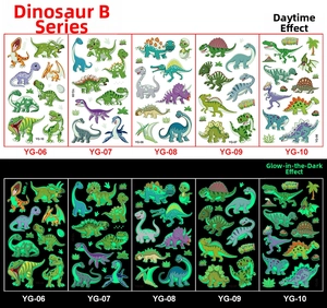 Luminous dinosaur cartoon tattoos for kids showing day colors and green night glow effect