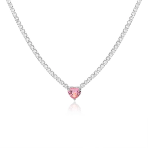 Close-up of pink heart-shaped crystal pendant on a silver-plated tennis choker necklace