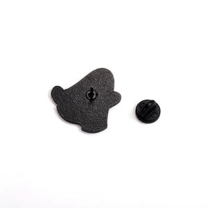 Back view of Halloween ghost enamel pin showing black metal pin and rubber clutch back