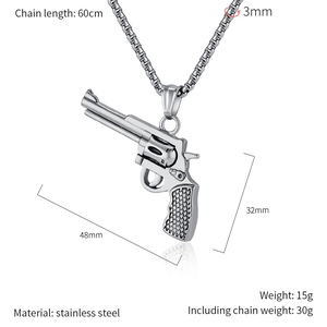 Macro detail of silver hiphop revolver pendant showing dimensions 48x32mm on white background