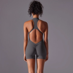 Deep grey backless athletic jumpsuit with scrunch detail and cut-out design