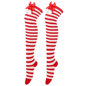 Detail of red and white striped over-knee socks with satin bows and plush pom-poms