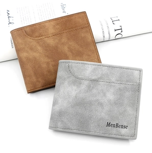 Detail of short bifold men's wallets with matte finish and letter print design