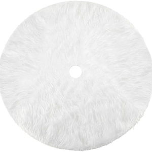 Plush white faux fur Christmas tree skirt with round opening and soft shaggy texture