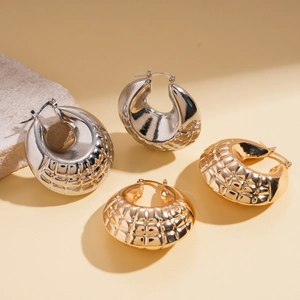 Vintage geometric metal hoop earrings with diamond pattern in gold and silver finish