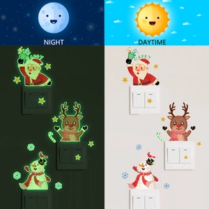 Luminous Christmas switch stickers with Santa and reindeer in day and night views