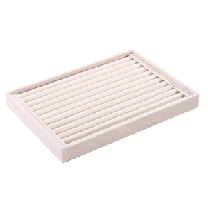 Beige velvet jewelry display tray for rings and earrings storage showcase