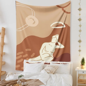 Detail of bohemian tapestry featuring abstract line art and earthy terracotta color blocks