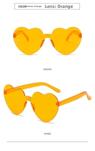 Front and 45-degree side view of orange rimless heart-shaped jelly sunglasses