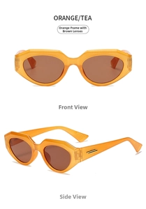 Detail view of orange cat-eye sunglasses with thick geometric frames and gold accents