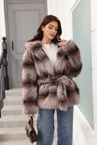 Detail of premium faux fur texture and waist belt on a hooded long-length winter coat