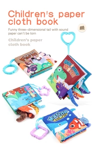 Detail of sensory baby cloth books with crinkle paper and 3D textured animal tails