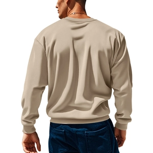 Detailed back view of khaki corduroy patchwork sweatshirt showing fabric texture