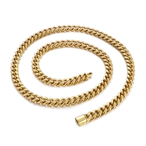 Polished gold cuban link necklace with square clasp on white background